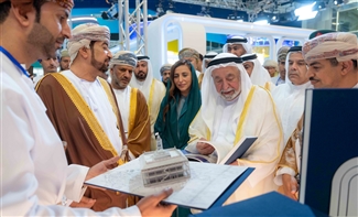 Sultan visits Muscat Int'l Book Fair, signs his latest historical work